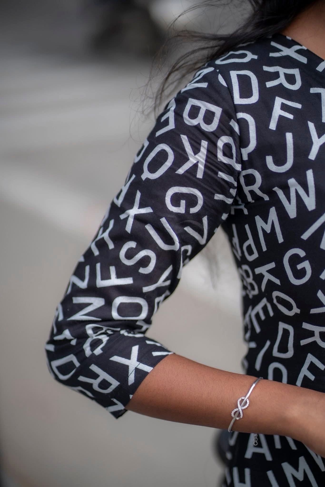 Black Beauty - Black cotton letters printed short top